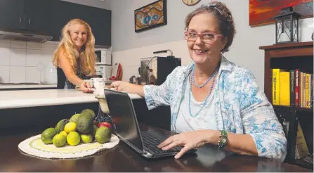  ?? Picture: GLENN HAMPSON ?? Hillary Hook, 62, (right) shares a house with Lyndall Lamond, 55, to reduce the cost of living.