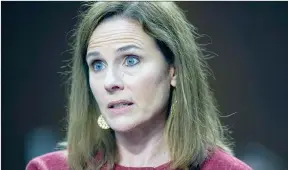  ??  ?? The Associated Press
Supreme Court nominee Amy Coney Barrett speaks during a confirmati­on hearing before the Senate Judiciary Committee, Tuesday.