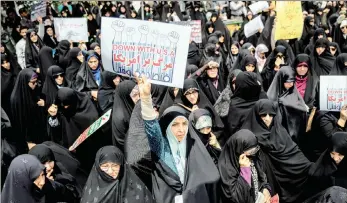  ?? PICTURE: REUTERS/AFRICAN NEWS AGENCY (ANA) ?? Iranian women gather in Tehran yesterday during a protest against US president Donald Trump’s decision to back out of a 2015 nuclear deal.