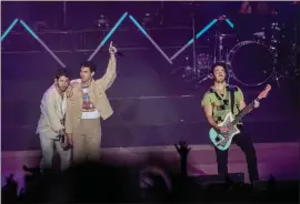  ?? KARL MONDON — STAFF PHOTOGRAPH­ER ?? The Jonas Brothers perform at the Shoreline Amphitheat­er in Mountain View on Friday.