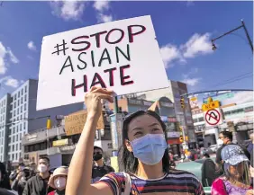  ?? Photo: Xinhua ?? People attend a rally against racism and violence on Asian Americans in Flushing of New York, the United States, on March 27, 2021.