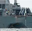  ?? Foto: afp ?? Der schwer beschädigt­e Zerstörer „USS John S. McCain“.