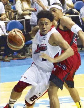  ?? MIGUEL DE GUZMAN ?? Alaska’s Calvin Abueva drives past San Miguel Beer’s Arwind Santos during the opener of the PBA Philippine Cup Finals at the Big Dome Sunday. The Aces won, 100-91.