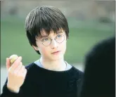  ??  ?? Daniel Radcliffe in Harry Potter and the Philosophe­r’s Stone.