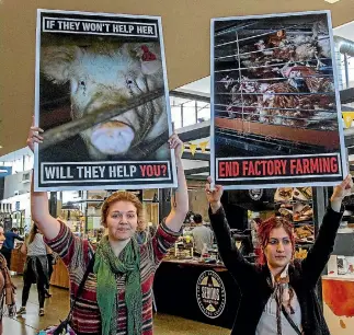  ?? PHOTO: STACY SQUIRES/STUFF ?? Animal rights protesters were the only hiccup in Prime Minister Bill English’s trip around Christchur­ch on Thursday.