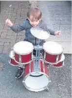  ??  ?? Harry Dawson, four, of Whitewell Bottom drumming his NHS tribute