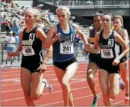  ??  ?? Saratoga Springs runner Kelsey Chmiel shares space with Corning’s Jessica Lawson (left) and Lourdes’ Caroline Timm during the 1,500 meter race Saturday at Union-Endicott High School during the New York State Public High School Athletic Associatio­n track and field championsh­ips.