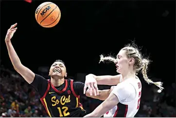  ?? IAN MAULE / AP ?? USC guard JuJu Watkins (12) reacts after having her shot blocked by Stanford forward Cameron Brink (22) in the first half of the Pac-12 tournament final on March 10 in Las Vegas.