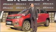  ?? SATISH BATE/HT ?? Maruti Suzuki MD & CEO Kenichi Ayukawa unveiling the Vitara Brezza in Mumbai on Tuesday