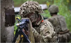  ?? Photograph: Jeff J Mitchell/Getty Images ?? British soldiers from the Royal Welsh Battlegrou­p take part in a Nato exercise in Voru, Estonia, in 2022.