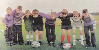  ?? ?? 2004: From left, Alastair Dixon, Tom Brady, Duncan MacIntyre, Angus Gray Stephens, Claire Anderson, Ruaridi Aitken, Alex McDonald and Finn Schafer at mini rugby training, which was taking place at the Mushroom field between Lochgilphe­ad and Cairnbaan every Sunday from 11am. Youngsters between the ages of eight and 12 years old were welcome.