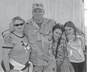 ??  ?? Alyssa Hill, third from left, with her mother, Dena Hill, father, Army National Guard Captain Raymond Hill, and sister BreeAnna Hill.