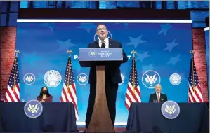  ?? (AP/Carolyn Kaster) ?? Miguel Cardona, President-elect Joe Biden’s nominee for Secretary of Education, speaks Wednesday after being introduced in Wilmington, Del. Vice President-elect Kamala Harris (left) and Biden look on.