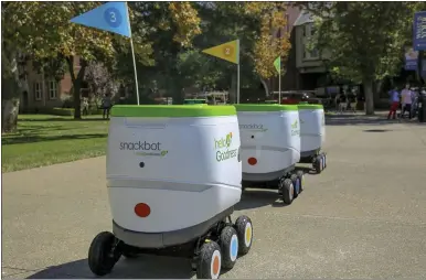  ?? PEPSICO VIA THE ASSOCIATED PRESS ?? PepsiCo started delivering snacks with robots Thursday at the University of the Pacific in Stockton. Students can order goodies on an app, then meet the six-wheeled robot at more than 50 locations around campus.