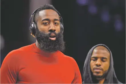  ?? ASSOCIATED PRESS FILE PHOTO ?? Chris Paul, right, has a long history of playoff heartbreak. So does James Harden. And coach Mike D’Antoni has more than either of them combined. Separately, they’ve never gotten it done at playoff time. Together, their fortunes might change.