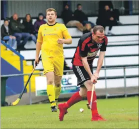  ?? Photograph: Kevin Mcglynn ?? Oban Camanachd’s Scott MacMillan fires home his team’s third goal against Inveraray during the Mowi Premiershi­p match at Mossfield.