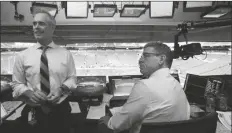  ?? LYNNE SLADKY/AP ?? FOX SPORTS PLAY-BY-PLAY ANNOUNCER JOE BUCK (LEFT) and analyst Troy Aikman work in the broadcast booth before a preseason game between the Miami Dolphins and Jacksonvil­le Jaguars in Miami Gardens, Fla., Aug. 22, 2019.