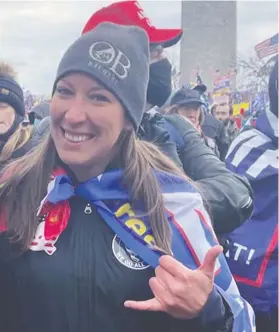  ?? AARON BABBITT ?? U.S. Air Force veteran Ashli Babbitt was shot as protesters were forcing their way into the House Chamber during Wednesday's siege of the U.S. Capitol in Washington.