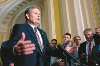  ?? J. SCOTT APPLEWHITE/AP ?? Sen. Steve Daines, seen Feb. 14, is the new chairman of the National Republican Senatorial Committee and wants the organizati­on involved in 2024 party primaries, a departure from former chairman Sen. Rick Scott.