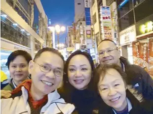  ??  ?? The author with her mom Jullie YapDaza and siblings Pete, Paul and Penny during a trip to Fukuoka in 2019.