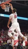  ?? NWA Democrat-Gazette/ANDY SHUPE ?? Arkansas’ Daniel Gafford dunks Feb. 10 against Vanderbilt at Walton Arena in Fayettevil­le. Gafford was named SEC Freshman of the Week for the third time Monday.