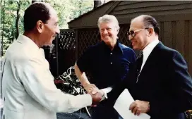  ?? FOTO GOB. EE.UU. ?? ONU fue clave para pactos de Camp David. En la foto Anwar Sadat (izq.), Menachem Begim (der.) y Jimmy Carter.