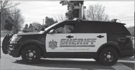  ??  ?? Cpl. Brian Connelly of the St. Mary’s County Sheriff’s Office points his radar gun at traffic in an attempt to curb aggressive driving.