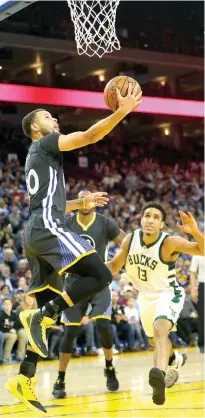  ?? AFP ?? STEPHEN CURRY #30 of the Golden State Warriors during the game against the Milwaukee Bucks at Oracle Arena on March 18 in Oakland, California.