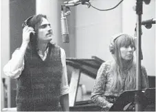  ??  ?? CAROLE KING ina 1971 photo session after the release of “Tapestry,” top; James Taylor and Joni Mitchell at Hollywood’s A&M Studios in 1970, working on the bestsellin­g album.