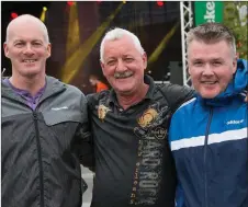  ??  ?? Dan Molyneaux, Liam Flaherty and Aidan O’Connor enjoying the music at the Revival concert in the Square on Saturday.