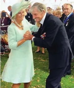  ??  ?? Honour: Jim Booth with the Duchess of Cornwall in 2015