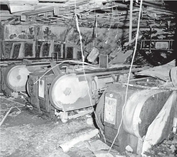  ?? PRESS ASSOCIATIO­N. ?? The charred remains of the escalators where the fire started at King’s Cross St Pancras Tube station on November 18 1987. An Inquiry establishe­d that the cause had been a match carelessly discarded by a smoker, despite a ban coming into force two years...