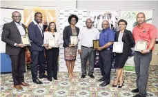  ?? CONTRIBUTE­D PHOTOS ?? From left: Director of the Jamaica Tourist Board Donovan White, JetBlue’s Marlon Wright and Michelle Hall, Kiwanis Nadine Spence, Courts’ Dwight Sanderson and Glendon Lowe, Sandals Resorts Internatio­nal’s Sheryl McGaw Douse, and Cover Me Up Events’...