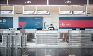  ?? ANDREW CABALLERO-REYNOLDS AFP VIA GETTY IMAGES ?? Delta Air Lines said the number of employees who have agreed to take voluntary leave has now surpassed 41,000 as the carrier rushes to cut costs.