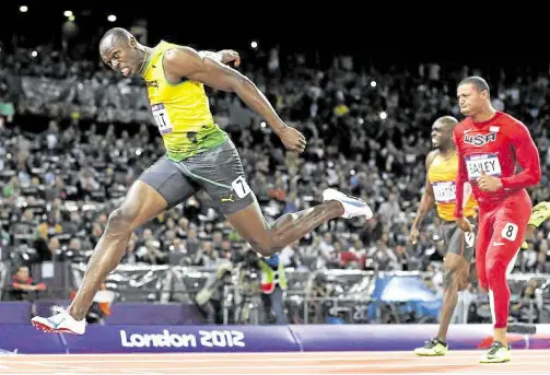  ??  ?? CLEAR WINNER
The legendary Jamaican went practicall­y untouched in winning his second century dash in 2012.
