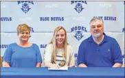  ?? Courtesy of Floyd County Schools ?? Model senior Montana Moats signs to continue her academic and basketball journey at Southern Union State Community College in Wadley, Alabama. Pictured from left to right: J’may (mother), Montana and Richey (father).