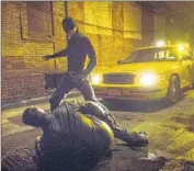  ?? Barry Wetcher Netflix ?? THE OLD-SCHOOL danger in “Daredevil” includes fights that occur on roofs, in alleys and under bridges.
