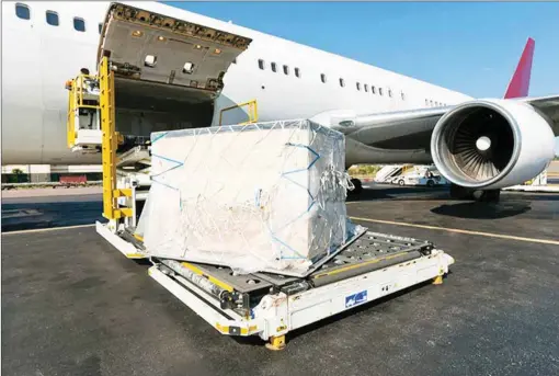  ??  ?? Cargo being loaded into an aircraft