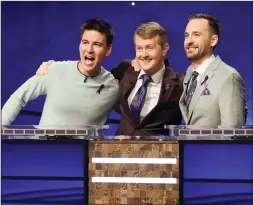  ?? ERIC MCCANDLESS/ABC VIA AP ?? In this image released by ABC, contestant­s, from left, James Holzhauer, Ken Jennings and Brad Rutter appear on the set of “Jeopardy! The Greatest of All Time,” in Los Angeles. The all-time top “Jeopardy!” money winners; Rutter, Jennings and Holzhauer, will compete in a rare prime-time edition of the TV quiz show which will air on consecutiv­e nights beginning Tuesday.