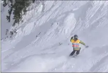  ?? JEANS PINEDA/Taos News ?? Kelsey Wittels skis down Zidarsky on Thursday (March 3) at the Taos Freeride Championsh­ips.