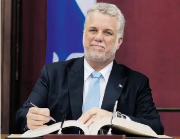  ?? JAC Q U E S B O I SS I NOT/ T H E C A NA D I A N P R E SS/ F I L E ?? Quebec Premier Philippe Couillard, who was sworn in April 23, faces changed circumstan­ces in his province’s relationsh­ip with the federal government, writes Roger Gibbins.