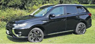  ?? PHOTOS: CHRIS BALCERAK / DRIVING ?? The 2018 Mitsubishi Outlander PHEV has become Mitsubishi Canada’s best-selling model in the past two months.