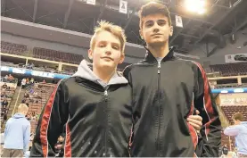  ?? MARK WOGENRICH/THE MORNING CALL ?? Saucon Valley freshmen Connor Nicholas, left, and Cael Markle delivered the clinching pins in their team's 38-22 win over Muncy on Thursday in the first round of the PIAA Class 2A team wrestling tournament at the Giant Center in Hershey.