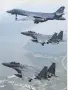  ?? Associated Press ?? A U.S. Air Force bomber, top, flies with South Korean fighter jets Sunday.