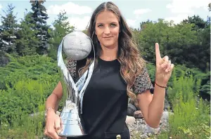  ?? Getty. ?? Karolina Pliskova of the Czech Republic is the new women’s tennis world No 1. The 25-year-old is seen with the WTA World Number One trophy in Toronto, Canada, where she will make her first appearance as the top player in the ladies’ game in the Rogers Cup which begins today.