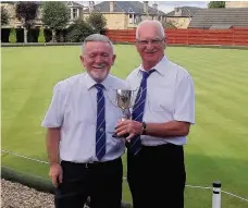  ??  ?? Five time champions Michael Dooley (left) and Hugh McNulty of Kirkhill, the fifth time winners of the Nominated Pairs trophy