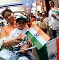  ??  ?? MUM KNOWS BEST: Children and parents thronged the Indian Consulate to be part of the celebratio­ns.