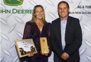  ?? ?? Southland Farm Machinery parts manager Megan Tree, of the Gore branch, won the John Deere Parts Technician of the Year award. She is pictured with John Deere aftermarke­t marketing manager Micheal Wilkins.