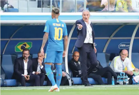  ?? Reuters ?? Brazil’s coach Tite gestures to Neymar during the match against Costa Rica. —