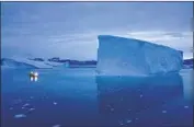  ?? Felipe Dana Associated Press ?? A LARGE iceberg in seen off Greenland, where parts of the ice sheet are melting at alarming rates.